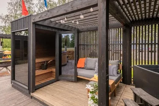 Modern outdoor sauna Kirami FinVision® -sauna S Misty with black thermal spruce cladding