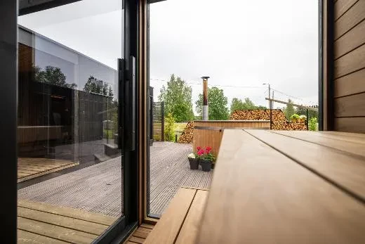 Outdoor saunas panoramic window brings the presence of nature closer to the bather in the Kirami FinVision® sauna S Misty